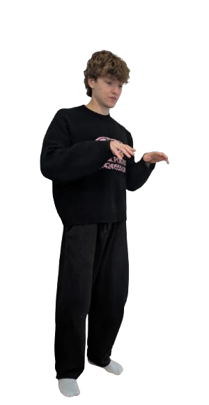 Moritz standing and typing on a keyboard in the air